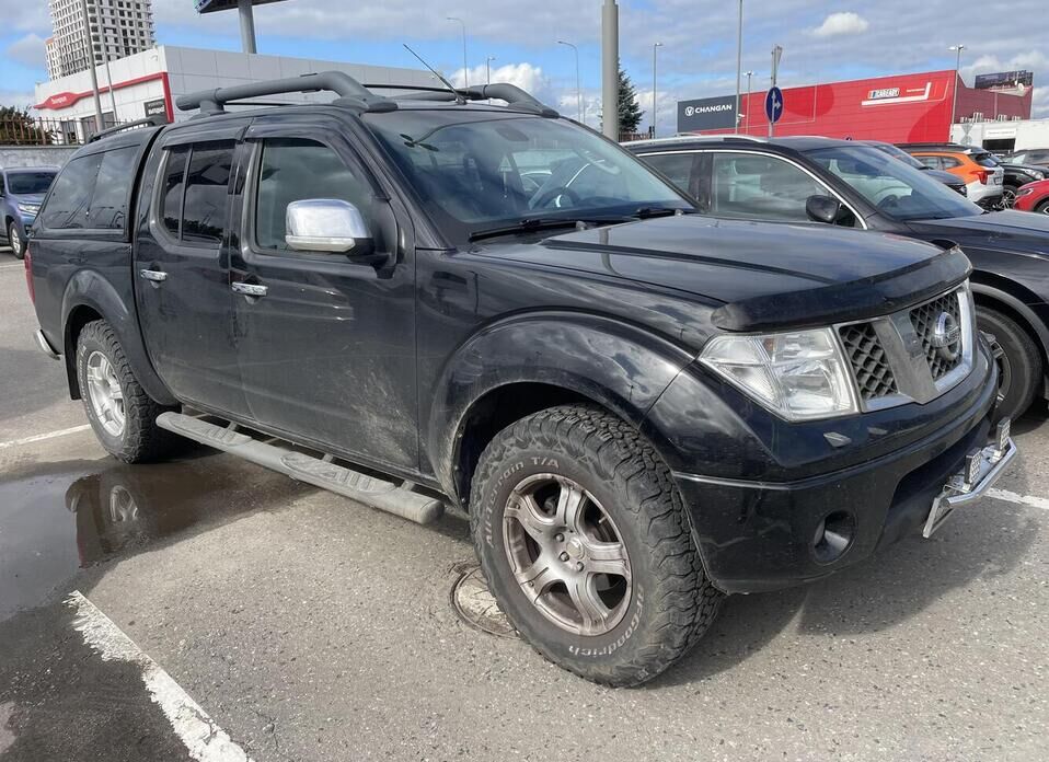Nissan Navara (Frontier) 2.5d AT (174 л.с.) 4WD