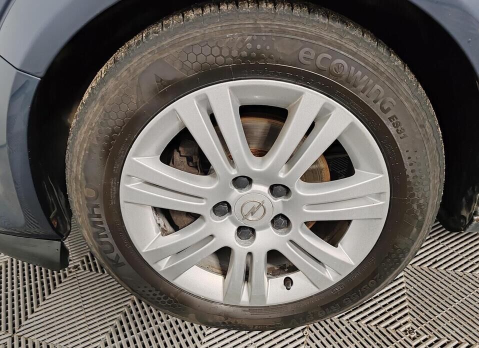 Opel Astra 1.8 AT (140 л.с.)