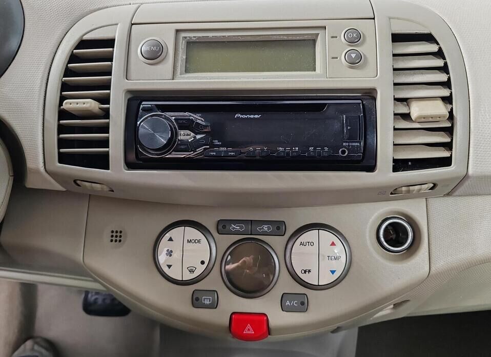 Nissan Micra 1.4 AT (88 л.с.)