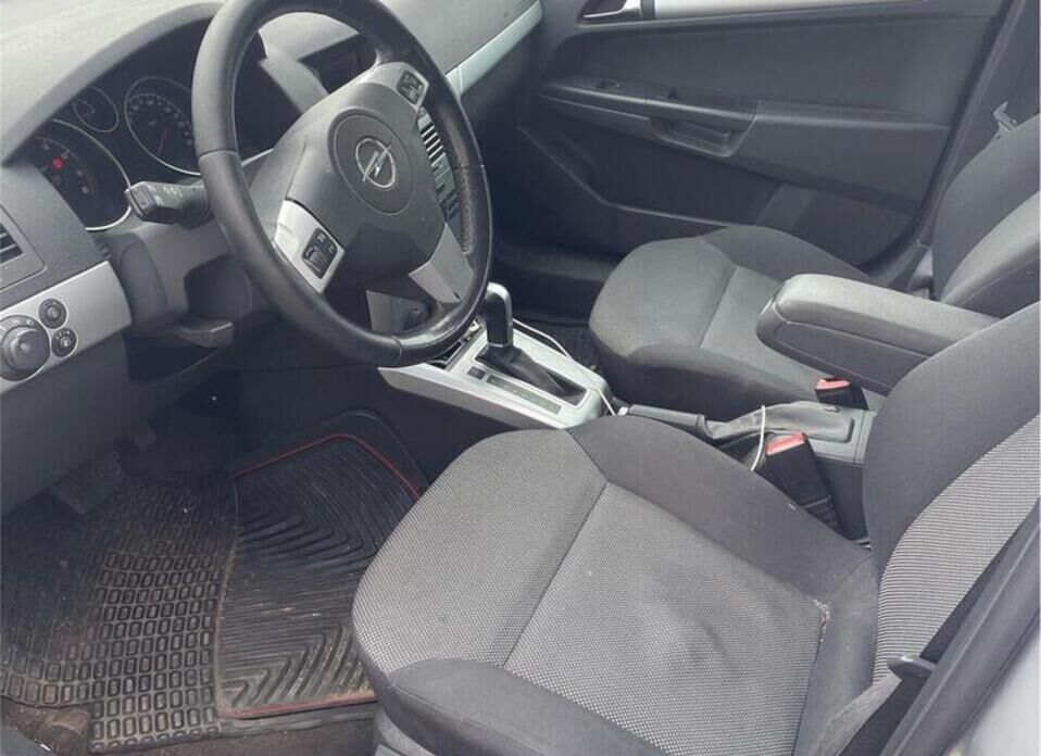 Opel Astra 1.8 AT (140 л.с.)