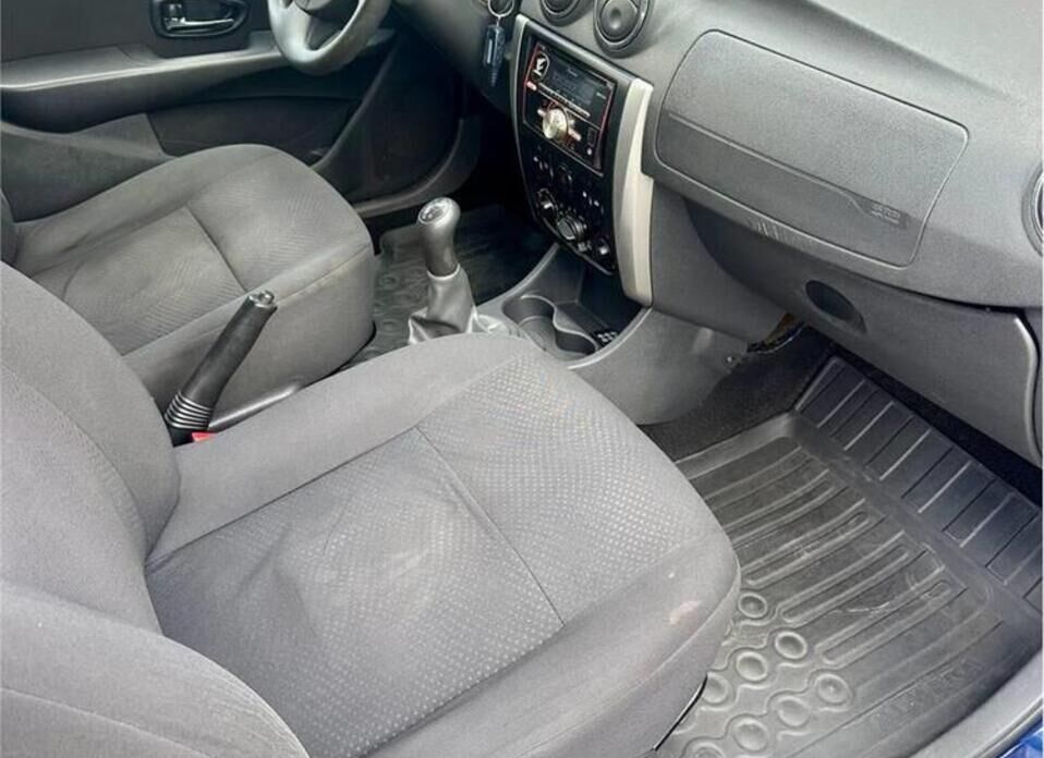 Nissan Almera 1.6 MT (102 л.с.)