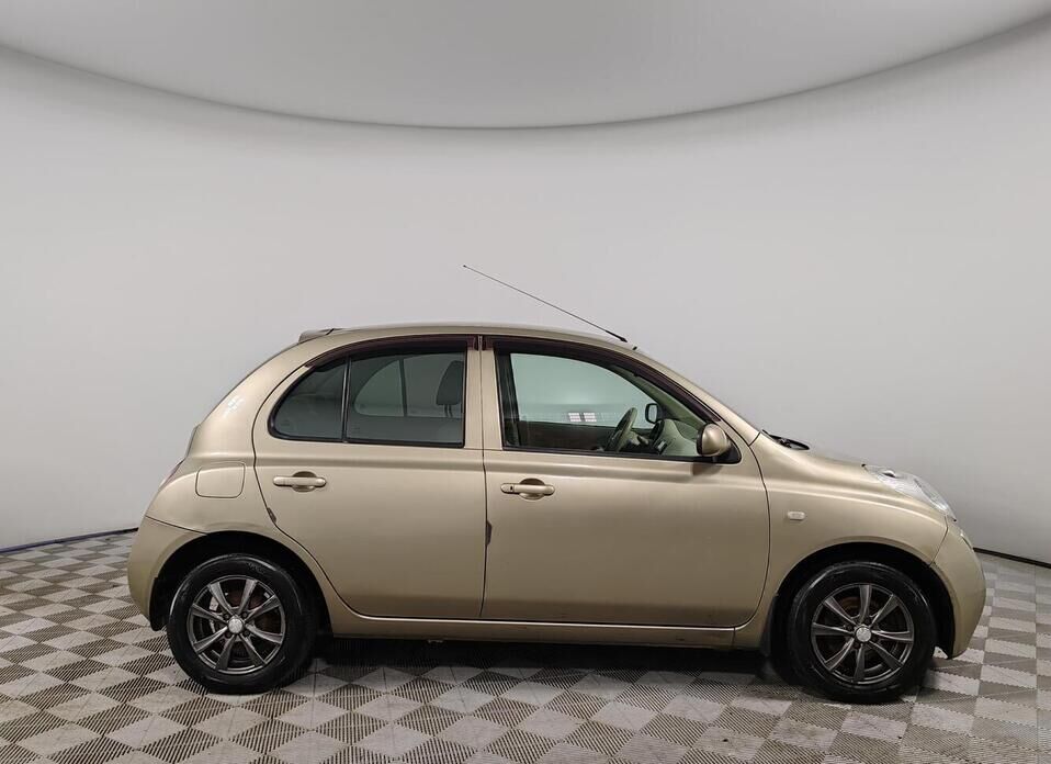 Nissan Micra 1.4 AT (88 л.с.)