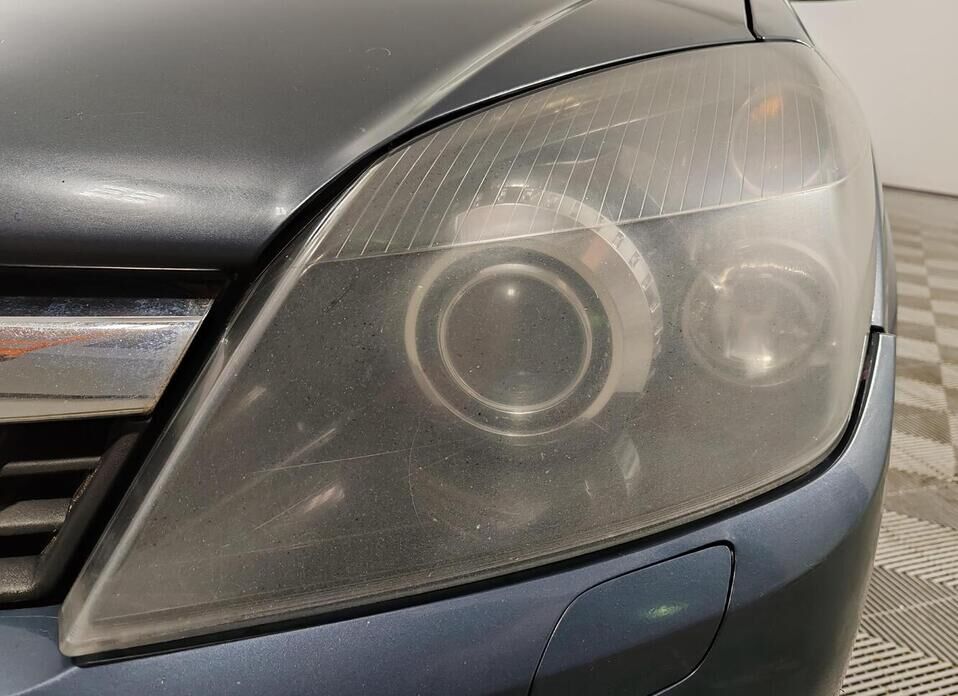 Opel Astra 1.8 AT (140 л.с.)