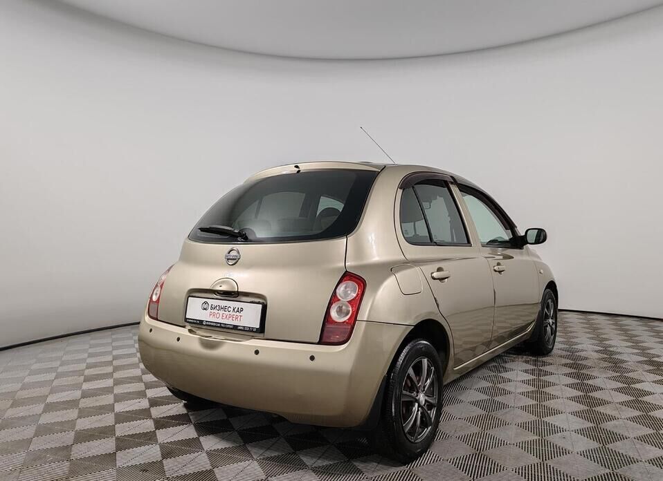 Nissan Micra 1.4 AT (88 л.с.)