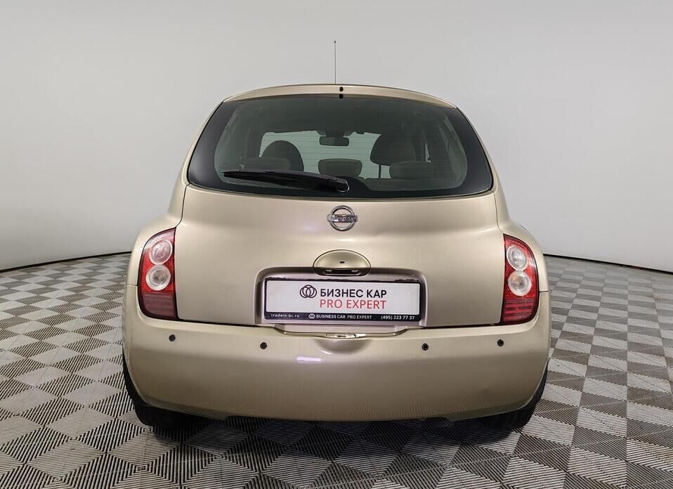 Nissan Micra 1.4 AT (88 л.с.)