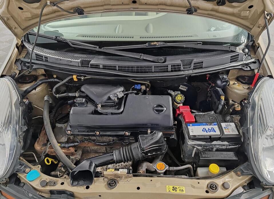 Nissan Micra 1.4 AT (88 л.с.)